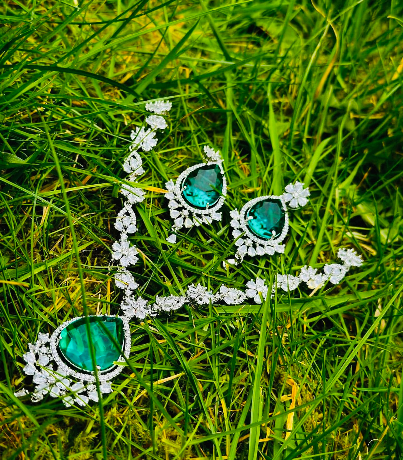 Advika: Emerald And Silver- Plated Jewellery Set