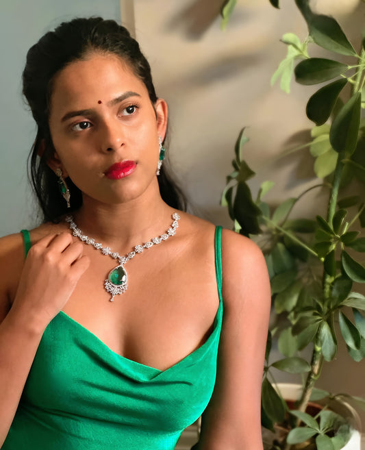 Advika: Emerald And Silver- Plated Jewellery Set